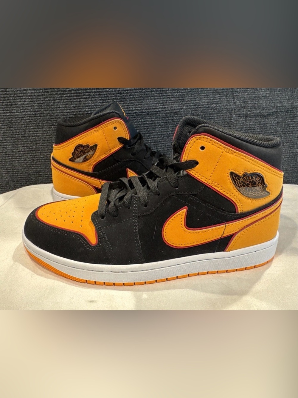 Jordan Kids High-Top Sneakers in Black and Orange